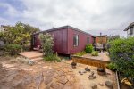 Plenty of space in the backyard with ample seating to gather with loved ones.